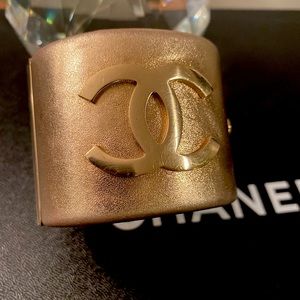 Authentic  Chanel metallic Gold cuff . Timeless piece and a great investment
